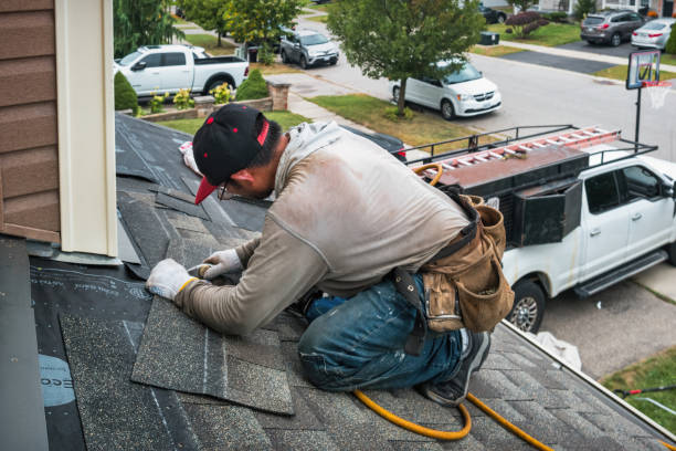 Professional Flat Roof Repair technician working in Bastrop, TX